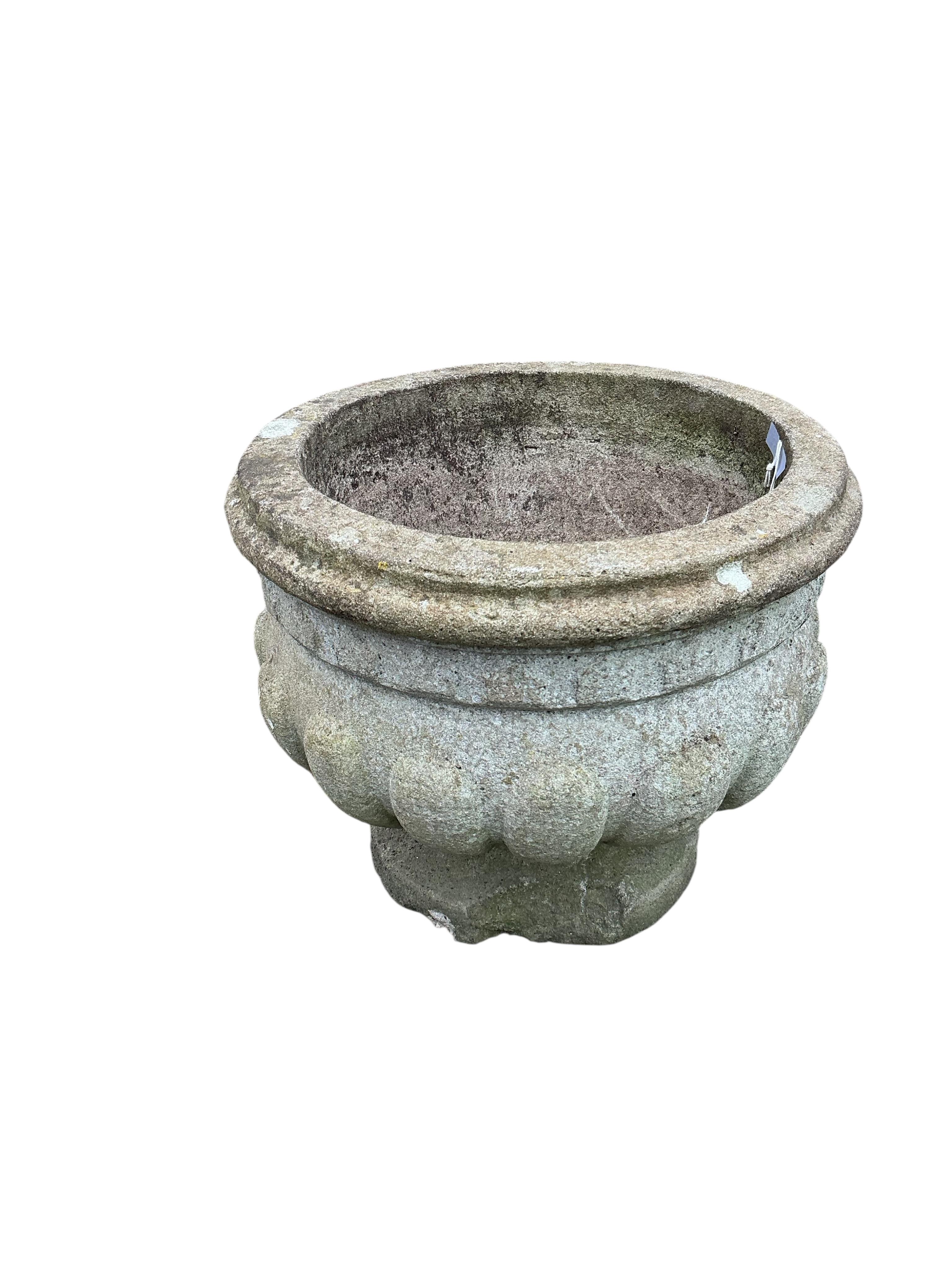 A pair of circular reconstituted stone garden planters, diameter 50cm, height 41cm